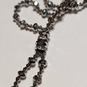 Lariat Multifaceted Silver Metallic Beaded Necklace with Rhinestones and Tassle